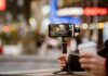 TikTok Star Gunned Down On Camera Smartphone on a handheld gimbal filming a city street at night