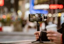 TikTok Star Gunned Down On Camera Smartphone on a handheld gimbal filming a city street at night