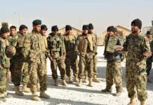 America Is Finally Closing Its Long Iraq Chapter Soldiers in camouflage gather for a briefing outdoors
