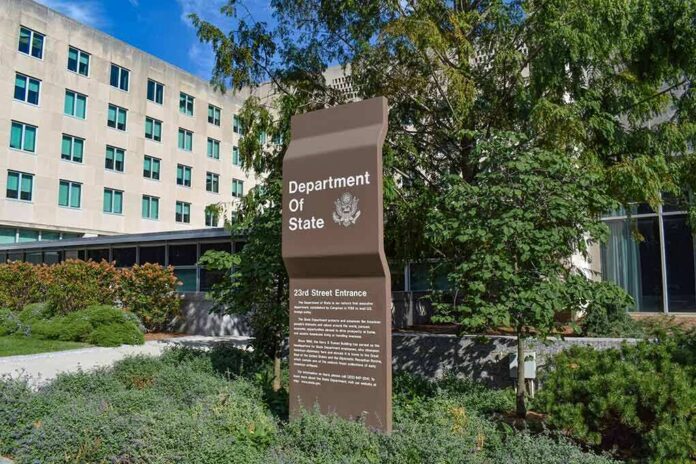 Department of State sign outside an office building