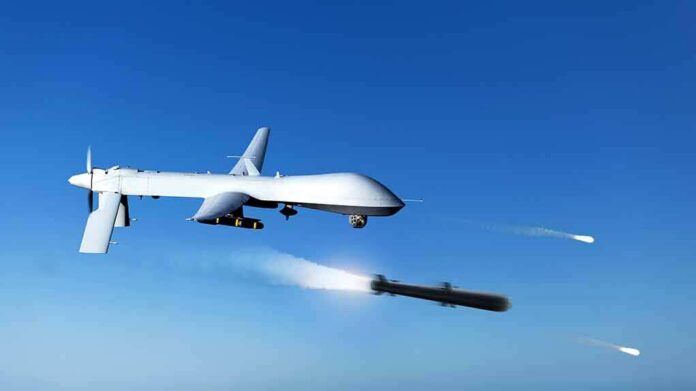 military drone firing missiles in clear blue sky