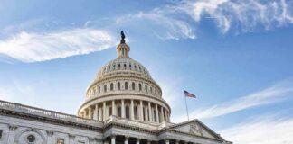 United States Capitol building under a blue sky