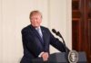 Trump Wants In. Some Republicans Face A Calculation man at podium with presidential seal
