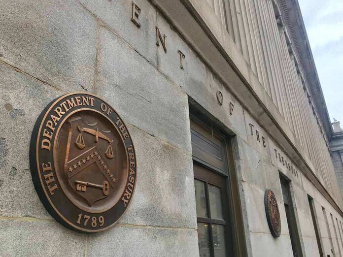 U.S. Treasury building exterior with bronze seal on stone wall