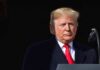 Trump Vows Instant Iran Win — Aides Balk Donald Trump at a podium with a microphone