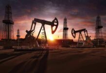 Russia’s Oil Just Got Much Pricier For China Oil pumpjacks and derricks at sunset in a desert field