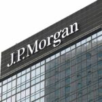 J.P. Morgan logo on a modern glass office tower