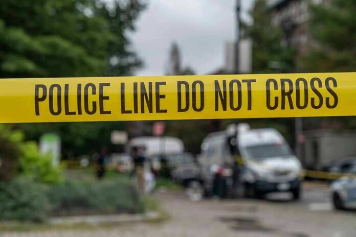 yellow police tape cordoning off a street scene