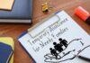 Immigration Arrests Trigger a New Taxpayer Fund Clipboard with TANF form and family icon on desk
