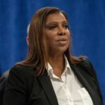 woman speaking at a press conference