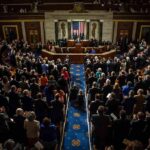 One House Vote Just Exposed A Democratic Divide Legislative chamber audience stands and applauds