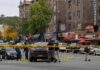 Armed Attack Rocks Ohio Campaign Stop Police investigate a taped-off urban street crime scene