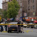 Armed Attack Rocks Ohio Campaign Stop Police investigate a taped-off urban street crime scene
