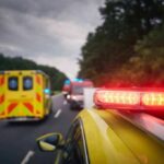 Vacation Turns Tragic After Five-Year-Old Disappears Emergency vehicles with flashing lights on a rural road