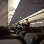 A Midair Struggle Became a Fight for Survival Flight attendant demonstrates safety procedures in airplane cabin