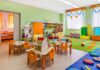 Preschool classroom with colorful furniture and toys