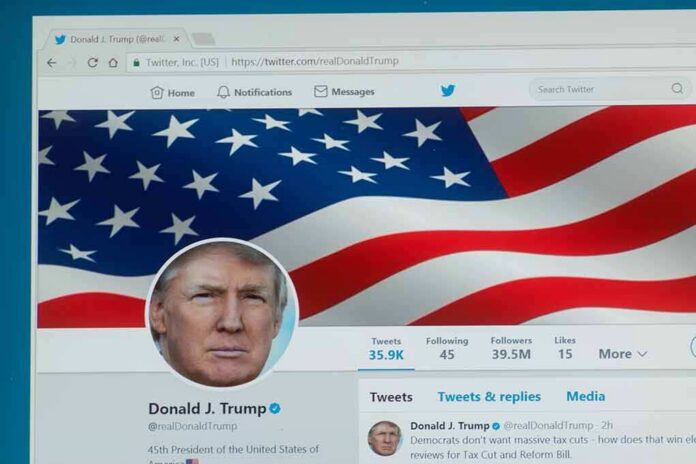 shutterstock_723880060 computer screen showing a social media profile with an american flag banner