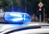 Three-Day Push Finds Dozens – How? Police car blue siren light flashing