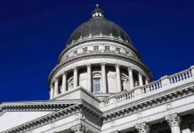 House Power Flip Looms – GOP On Edge Capitol building dome with columns against a deep blue sky