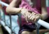 Outrage: Faith vs. Forced Death Allegation Elderly person’s hands resting on a hospital bed rail