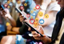 people using smartphones with social media reactions
