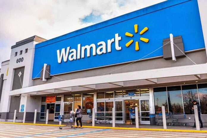 shutterstock_1643463436 Walmart store exterior with shoppers and carts