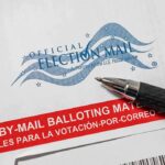 Mail Vote Slide Triggers Count-Day Jitters Official election mail envelope with pen