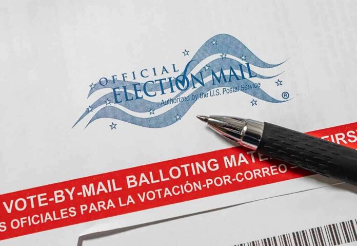 Official election mail envelope with pen