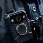 Body-worn camera attached to a uniform