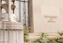 One Fraud Tip Could Bring A Big Payday Department of Justice building facade with stone sign and window