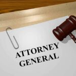 A State Legal Office Faces Serious Internal Questions judge's gavel beside attorney general document on desk