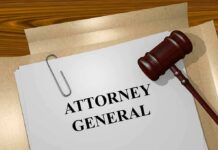 judge's gavel beside attorney general document on desk