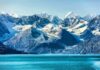A Mountain Landmark Is Running Out of Ice Snow-capped mountains with glaciers above a turquoise lake